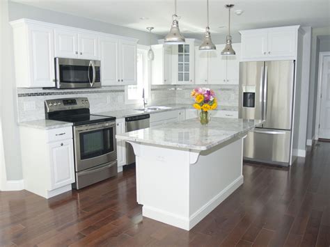 kitchens with white cabinets stainless steel refrigerator|white kitchen with stainless steel appliances.